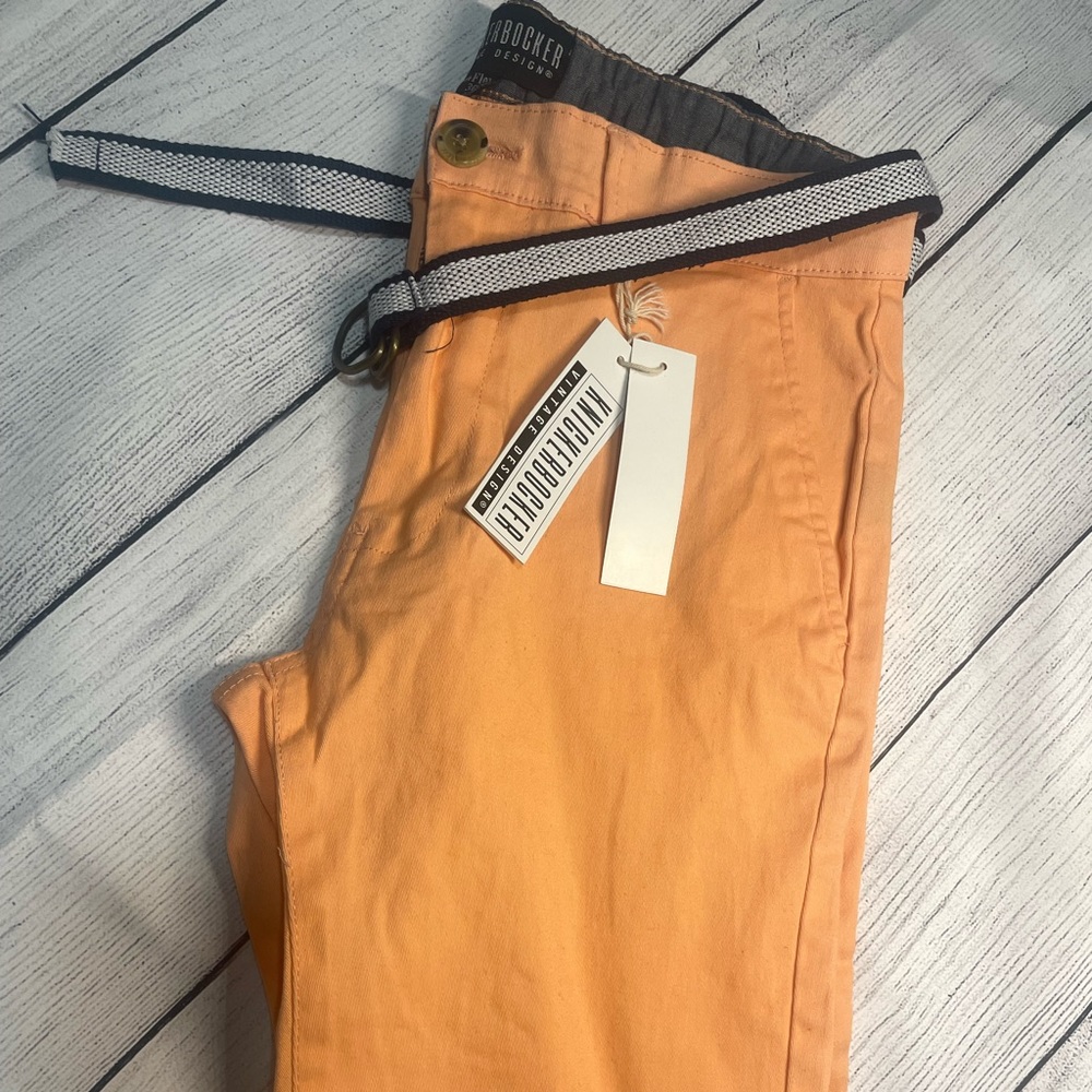 Brand new which comes with the tag and comes with canvas belt. Final Sale.